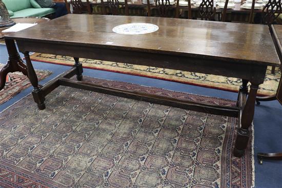 An 18th century style oak refectory table, W.196cm, D.86cm